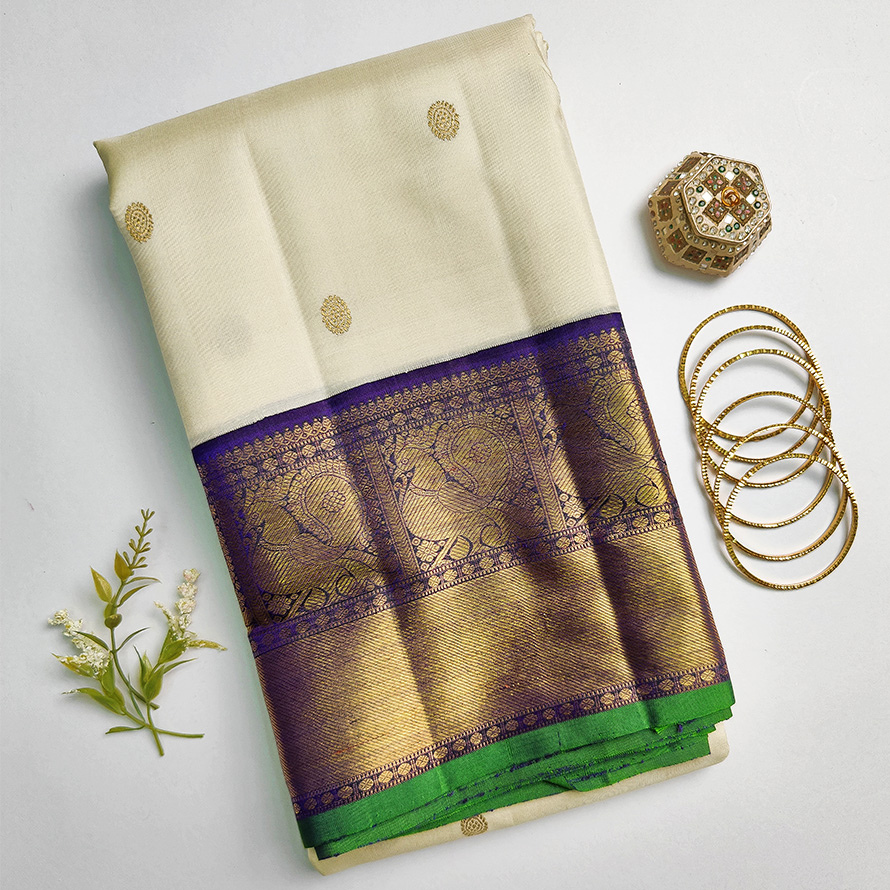 Off-White Kanchipuram Silk Saree – Zari Puttahs with Navy Blue Blouse