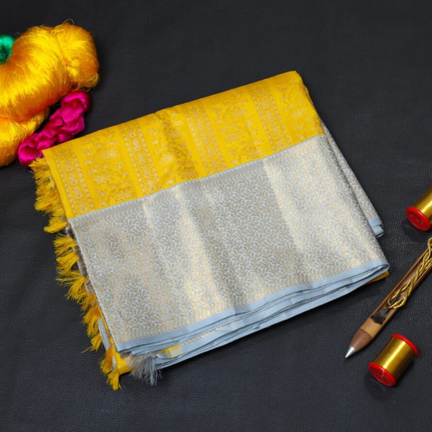 Lemon Yellow Kanchipuram Silk Saree – Self Silver Zari Design with Silver Grey Korvai Border