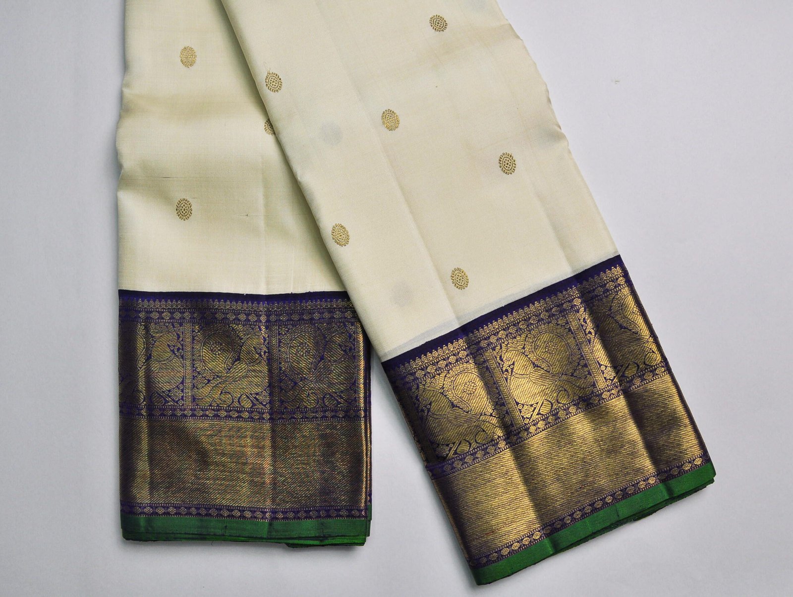Off-White Kanchipuram Silk Saree – Zari Puttahs with Navy Blue Blouse - Image 6