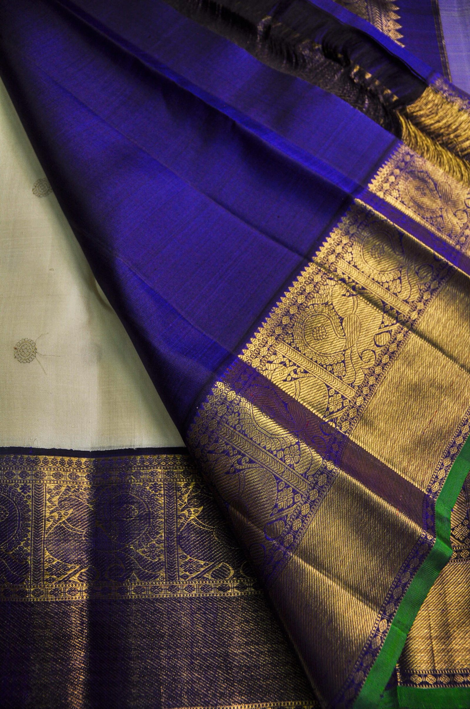 Off-White Kanchipuram Silk Saree – Zari Puttahs with Navy Blue Blouse - Image 4