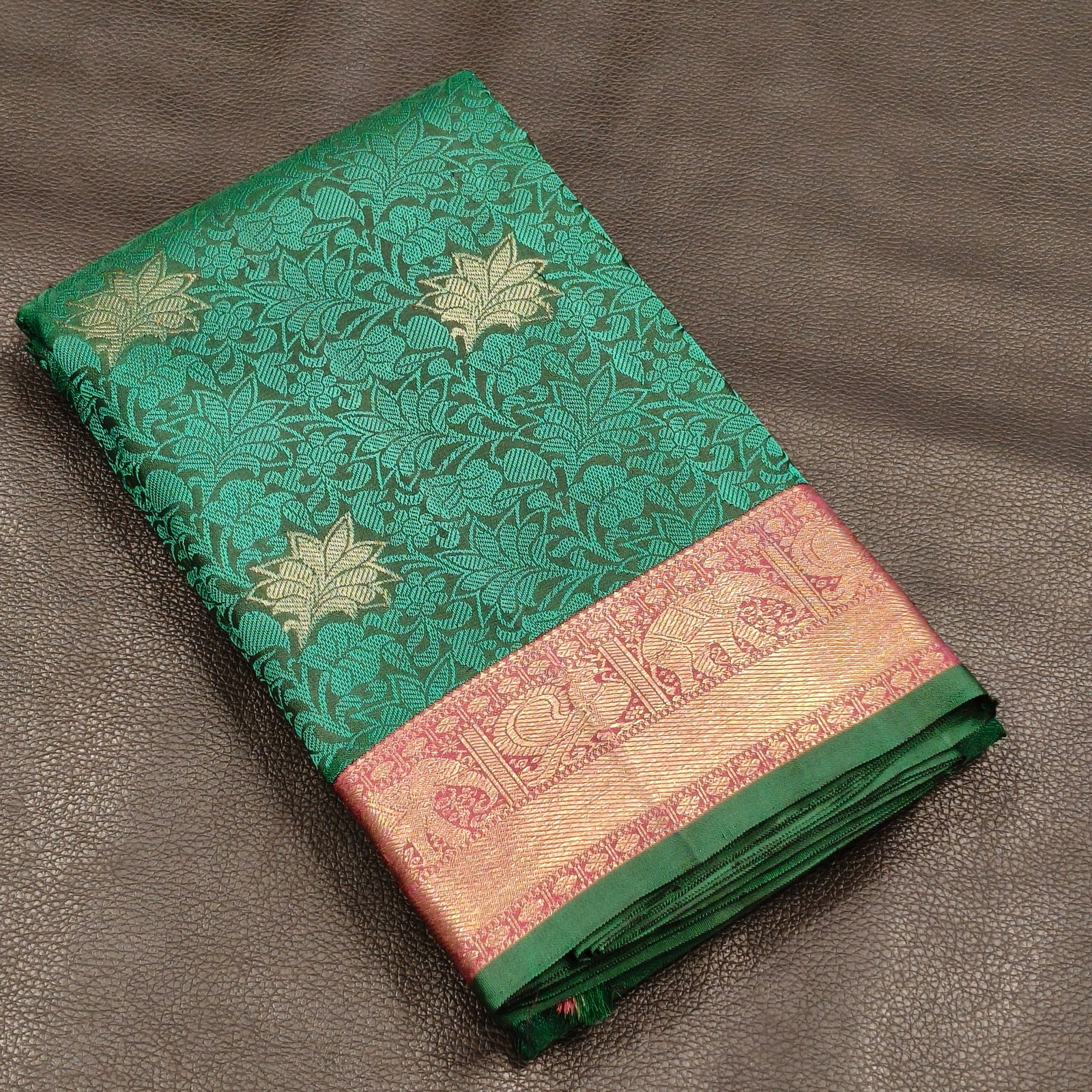 Rich Bottle Green Kanchipuram Pure Silk Saree with Thread & Floral Zari Buttas and Pinkish Gold Zari Border